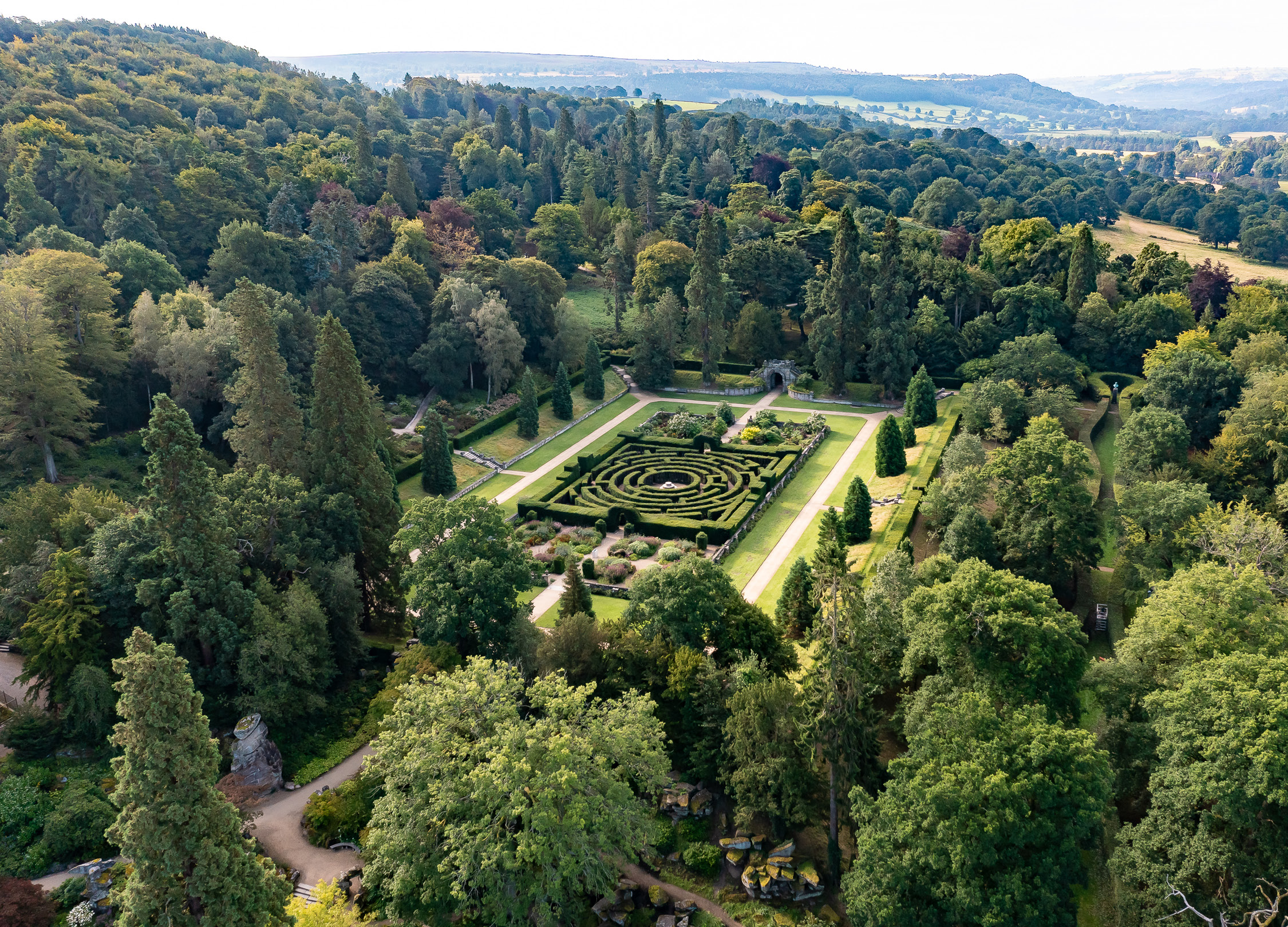 Aerial view of maze amongst trees