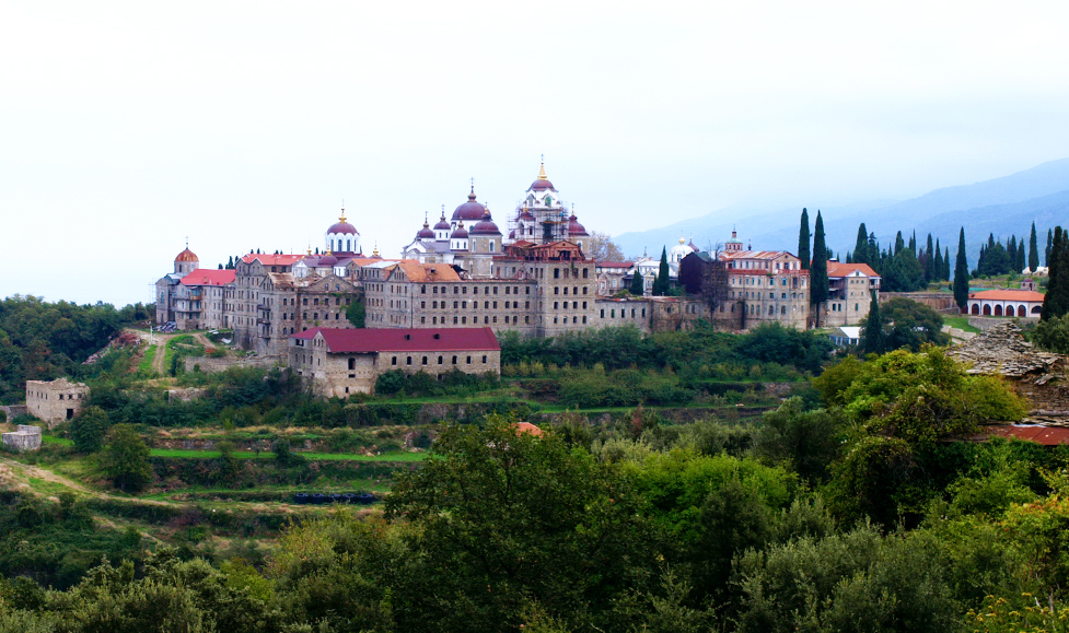 Landscape shot of monastery on top of hill