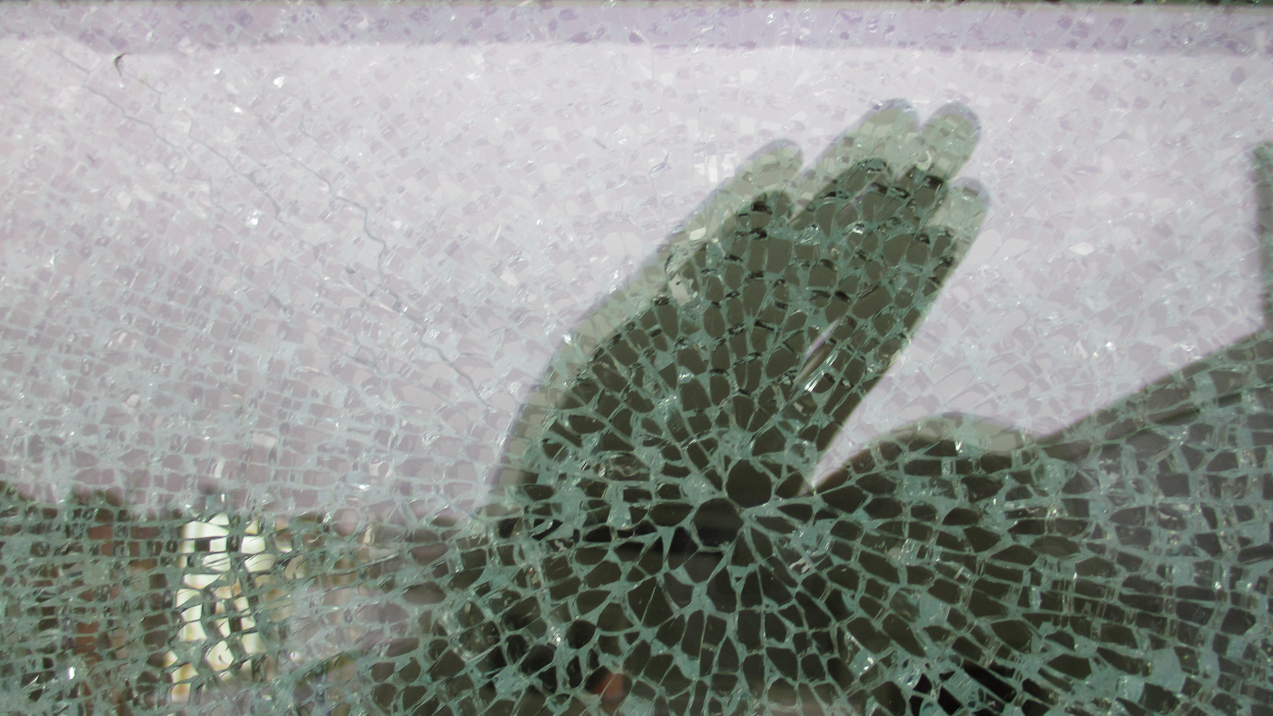 Toughened glass fracture due to nickel sulphite inclusions