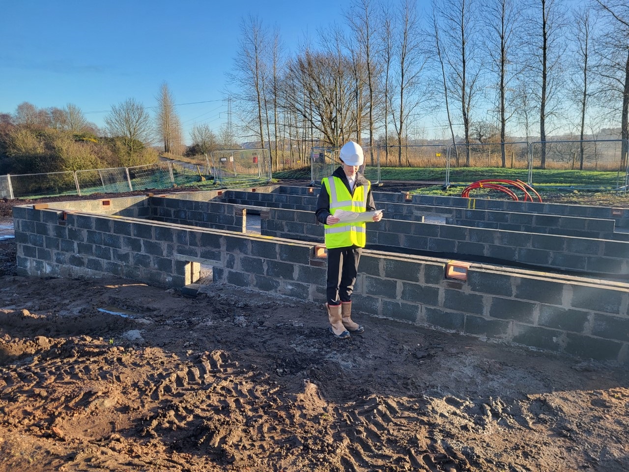Charlie Calder inspecting sub-structure of new-build housing