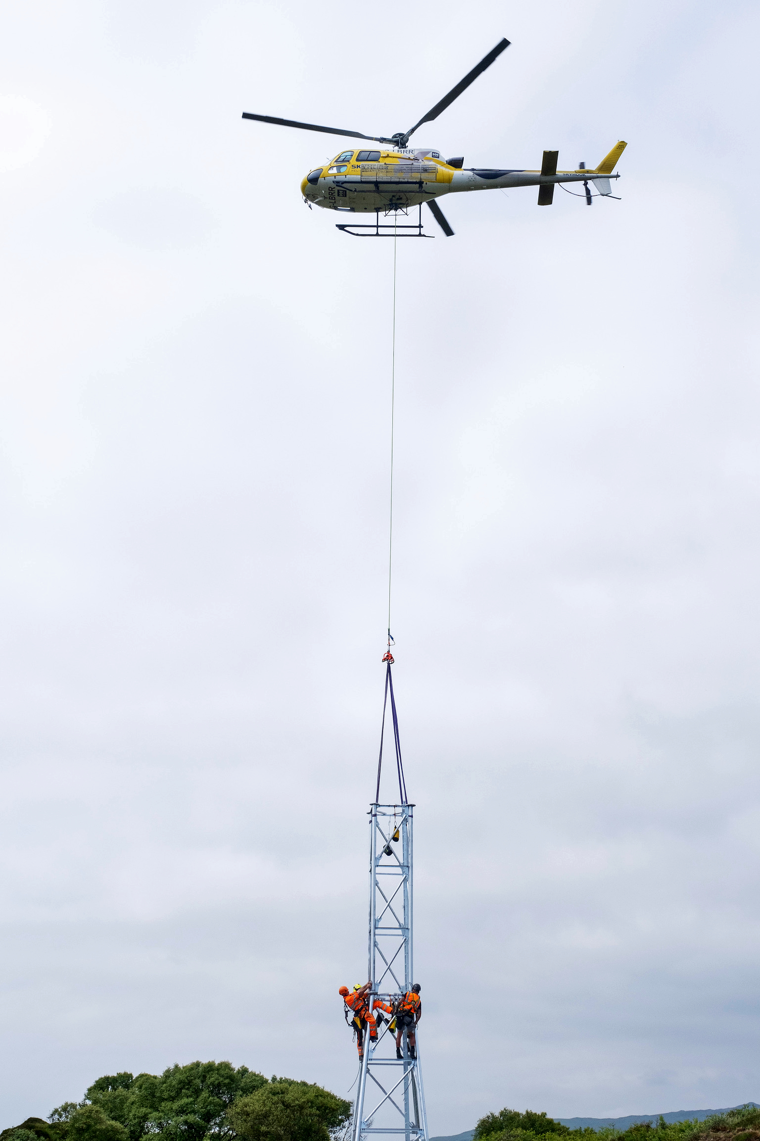 Helicopter over mast build, Uist, Scotland