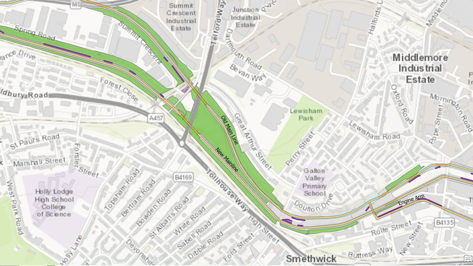 A screenshot of the map application that shows an example of baseline habitat parcels (green), hedgerow lines (purple), and watercourses (yellow) within a section the Canal and River Trust Network