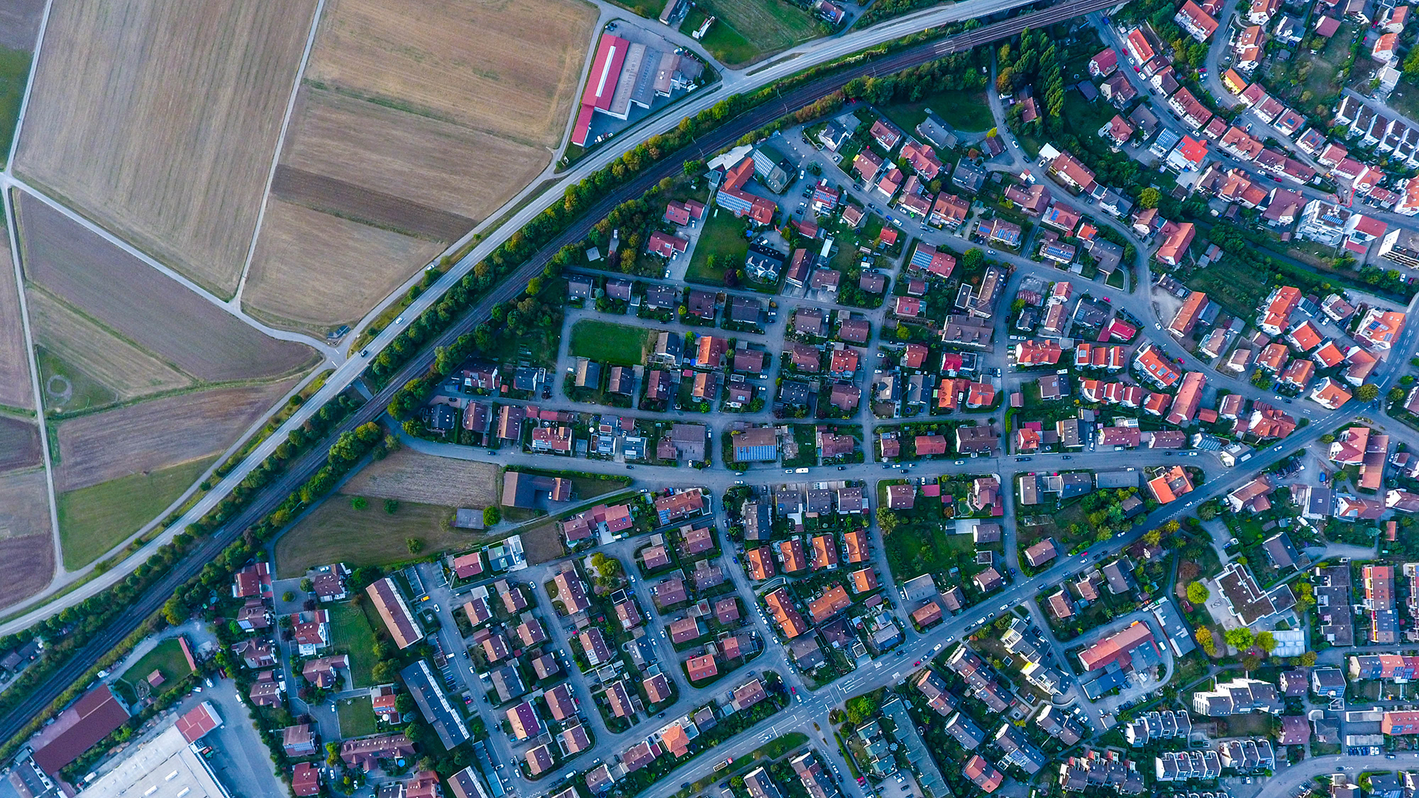 Aerial photo of houses and buildings, P and D conference