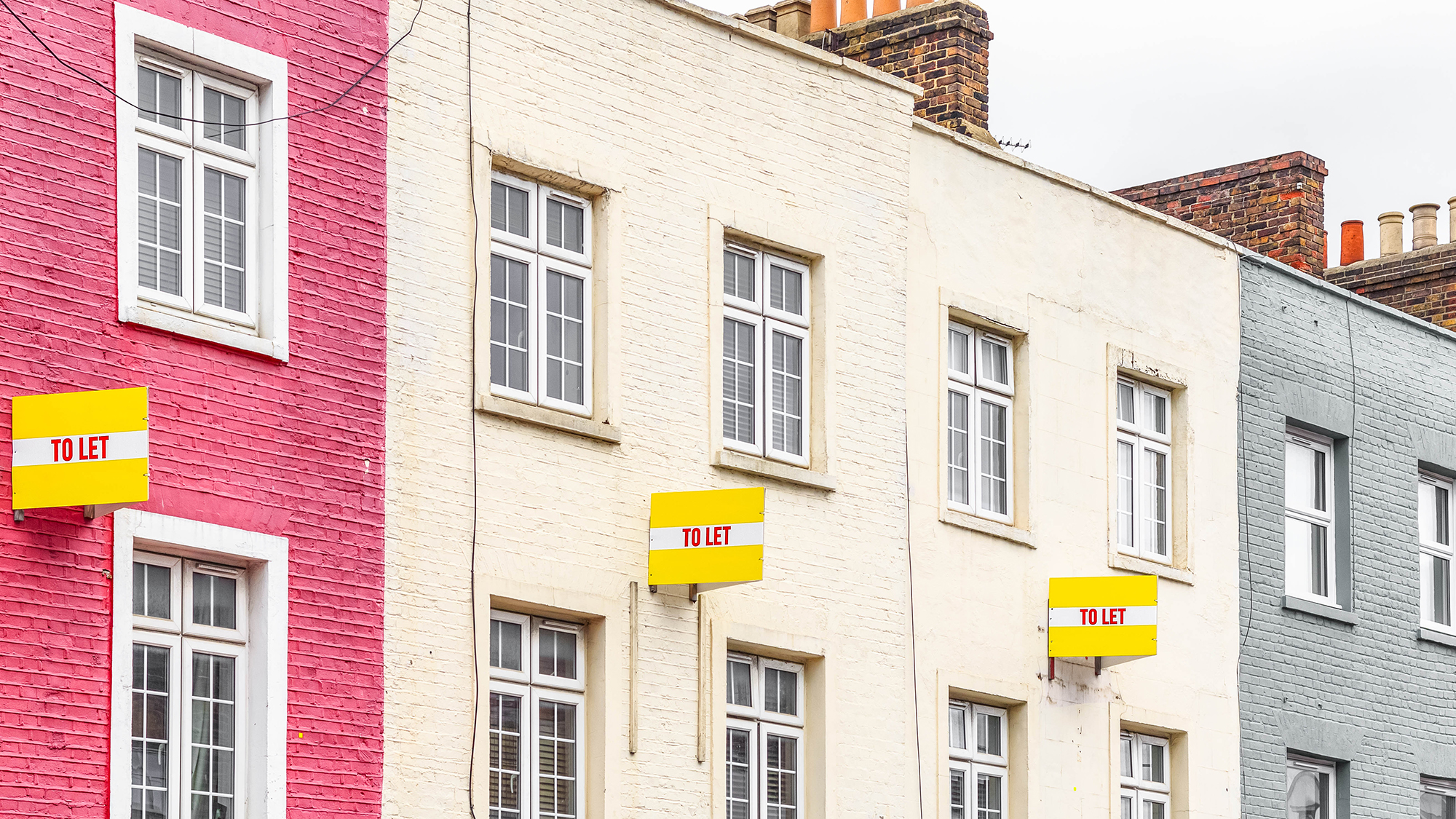 Colourful terraced houses with TO LET signs around Camden Town in London; Shutterstock ID 1056471788; purchase_order: N/A; job: Dellah Gilbert; client: ; other: 