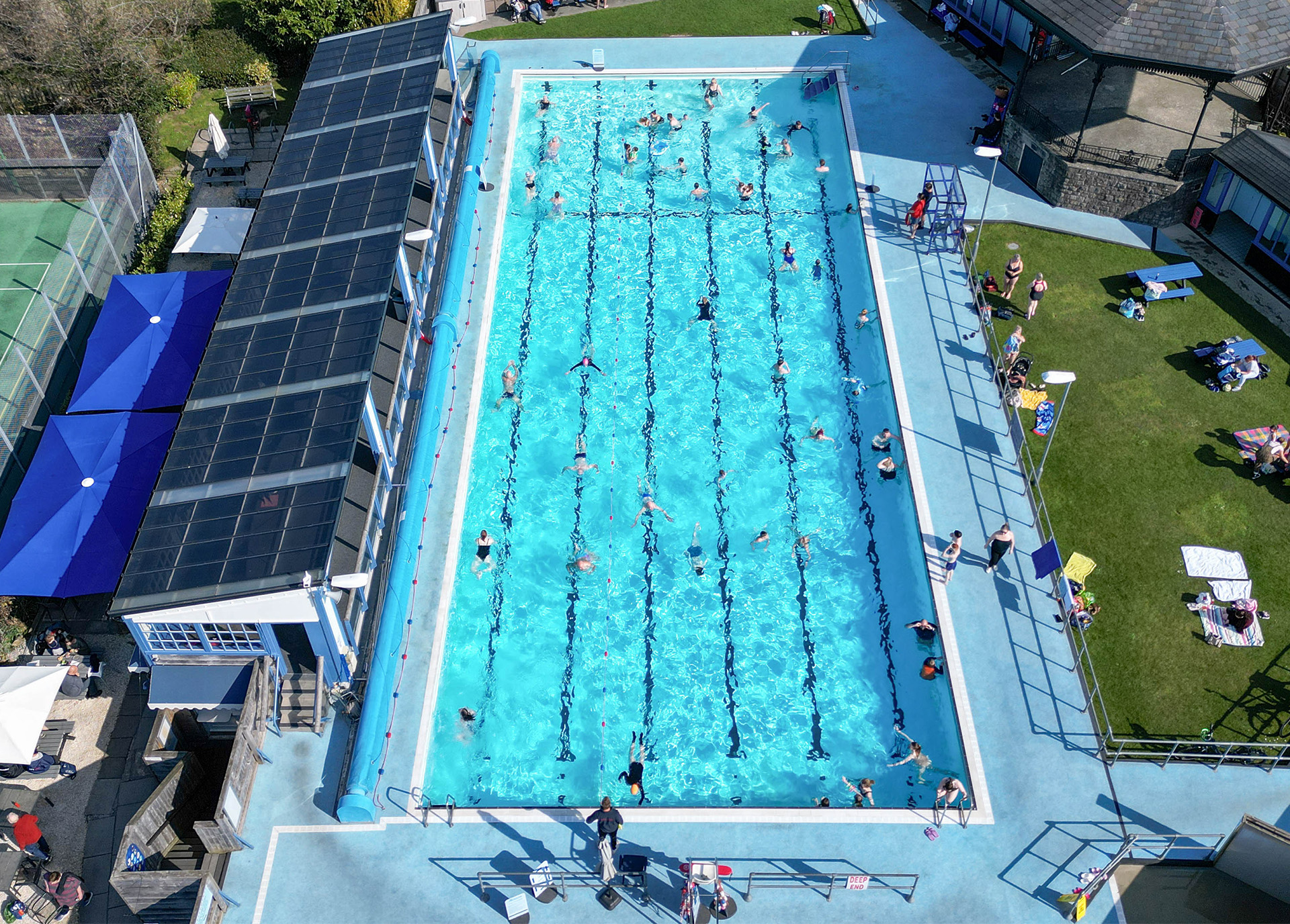 Hathersage outdoor pool Aerial view of people swimming in outdoor pool