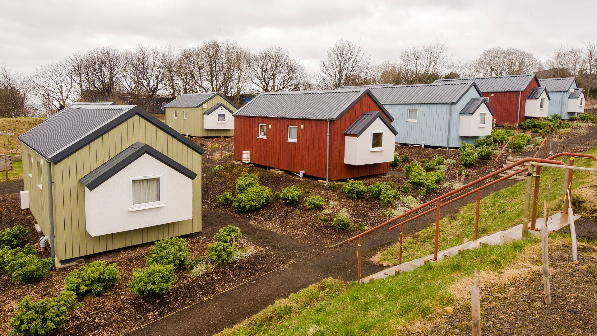 Row of tiny houses in Scotland for Social Bite