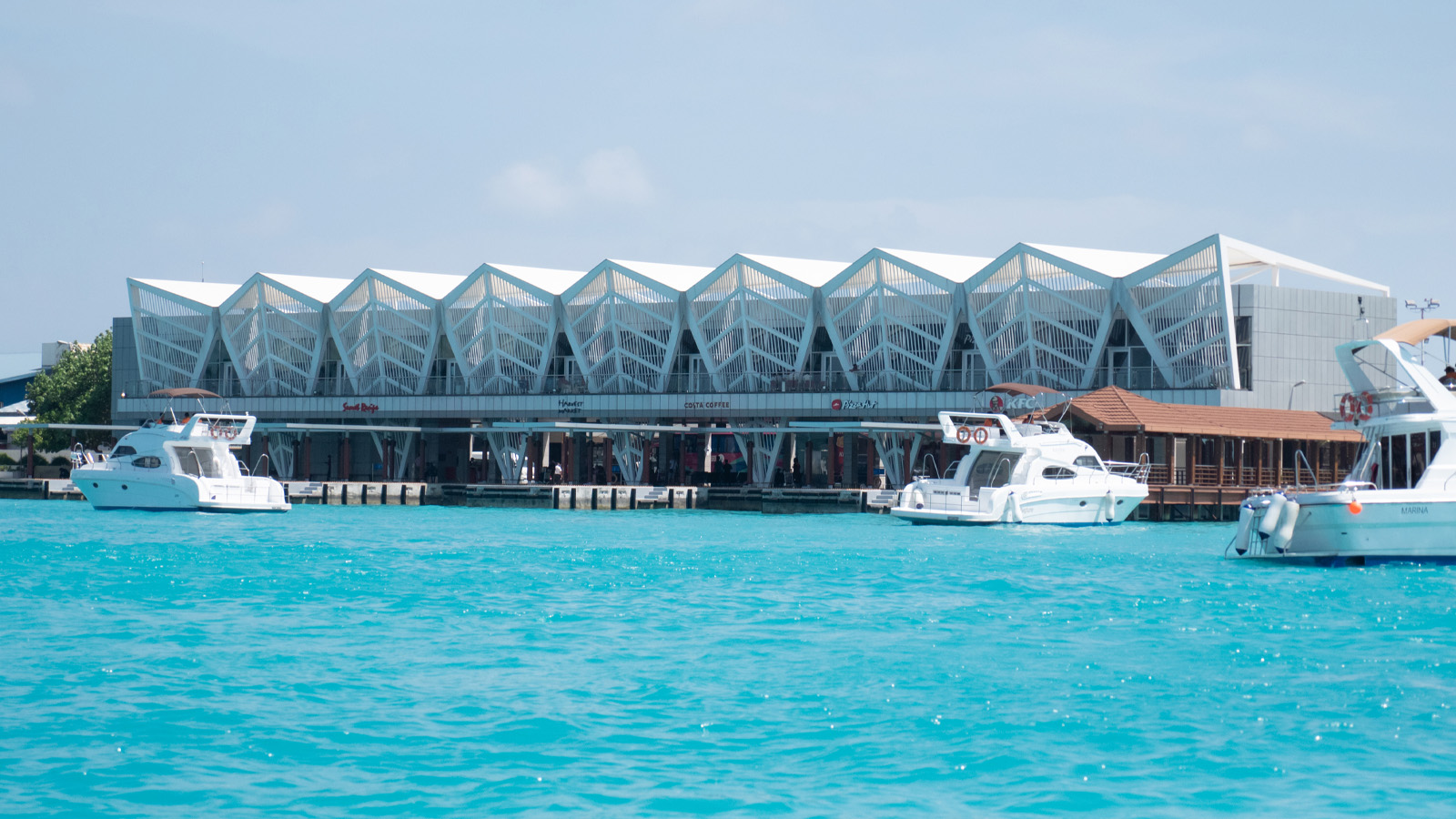Male. Maldives. Male Velana International Airport Pier, Maldives. Turquoise Water Sea.