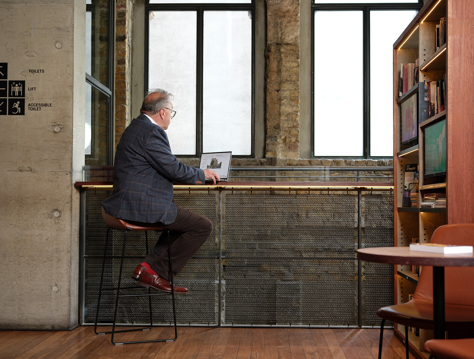 Photo of Guy Middleton MRICS working in the Royal Court Theatre
