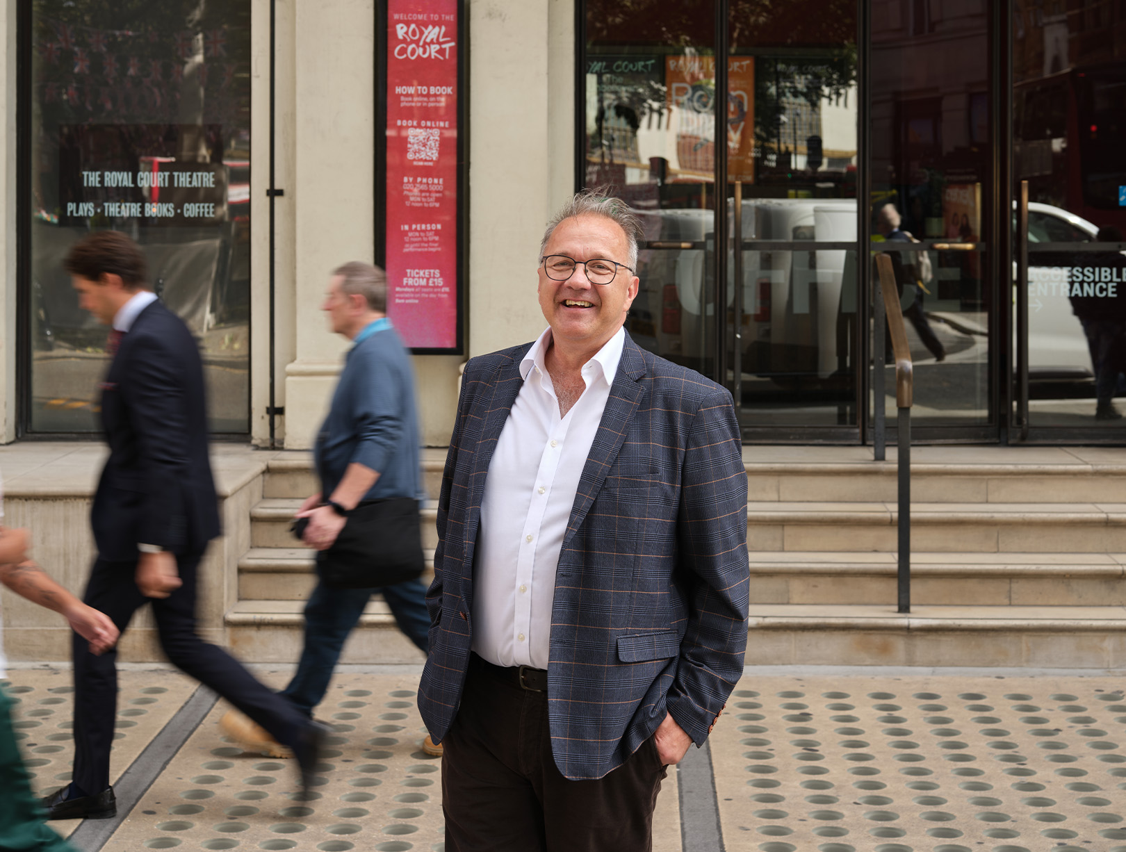 Photo of Guy Middleton MRICS standing outside the Royal Court Theatre