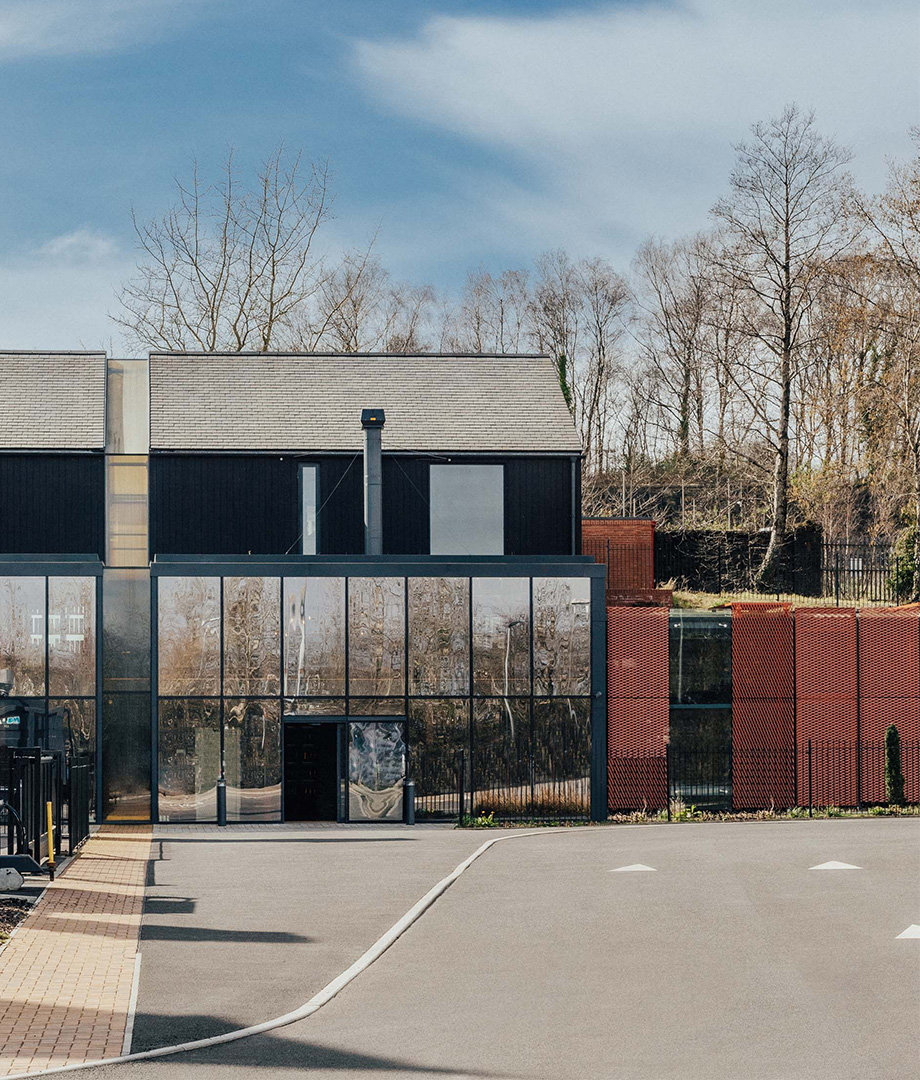 Photo of the outside of the connecting hallway at Pendryn Distillery 