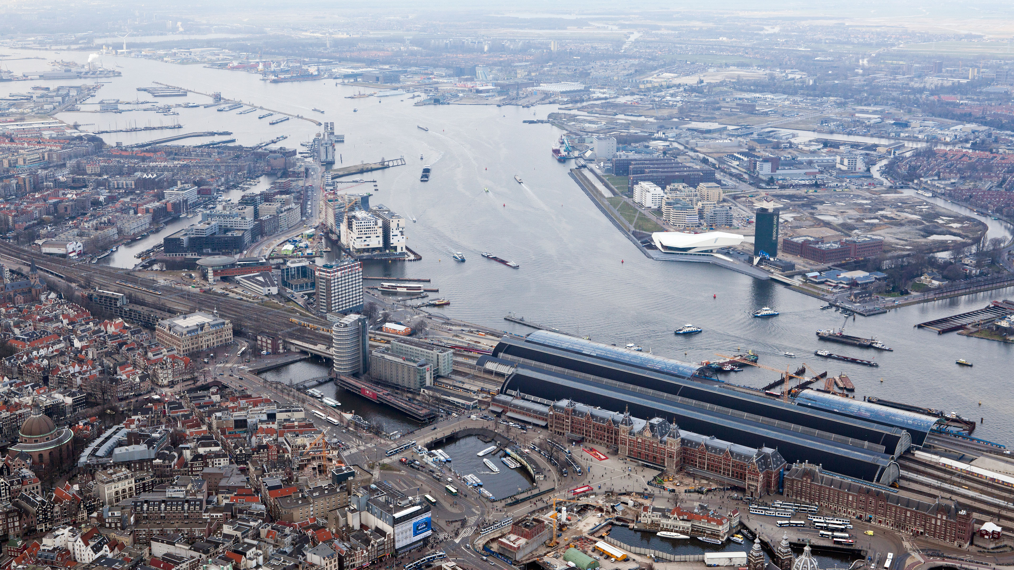 Aerial view of river running through Amsterdam
