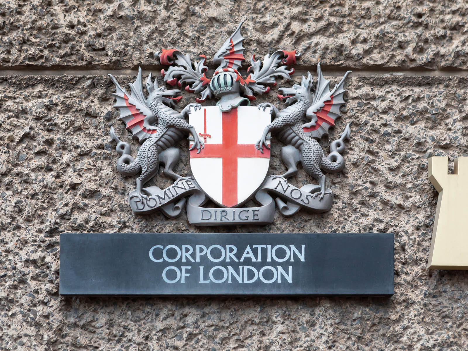 Sign for Corporation of London on concrete wall