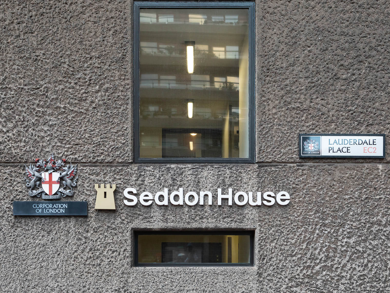 Sign for Seddon House on concrete wall