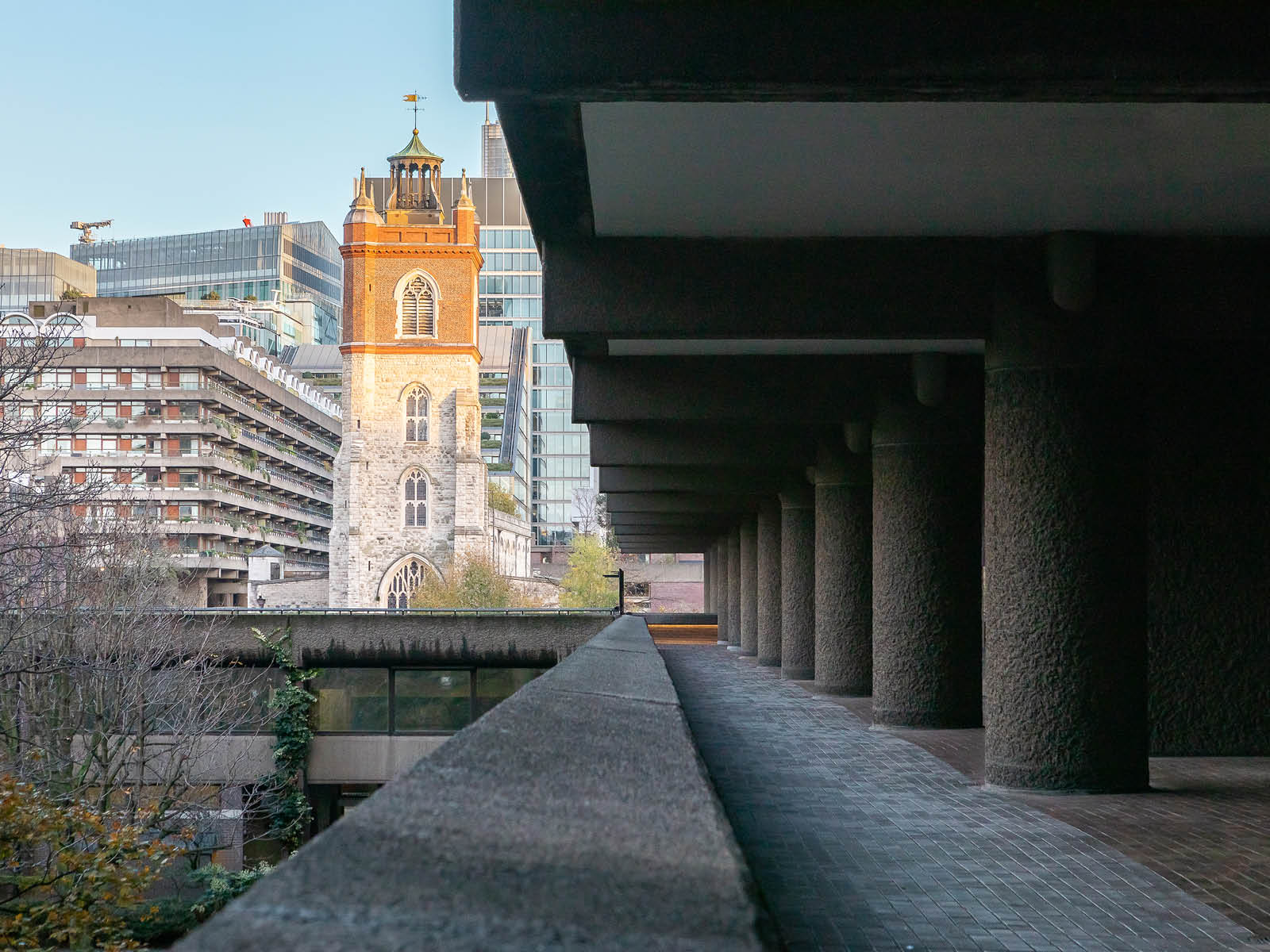 Looking down concrete walkway with Church in backdrop