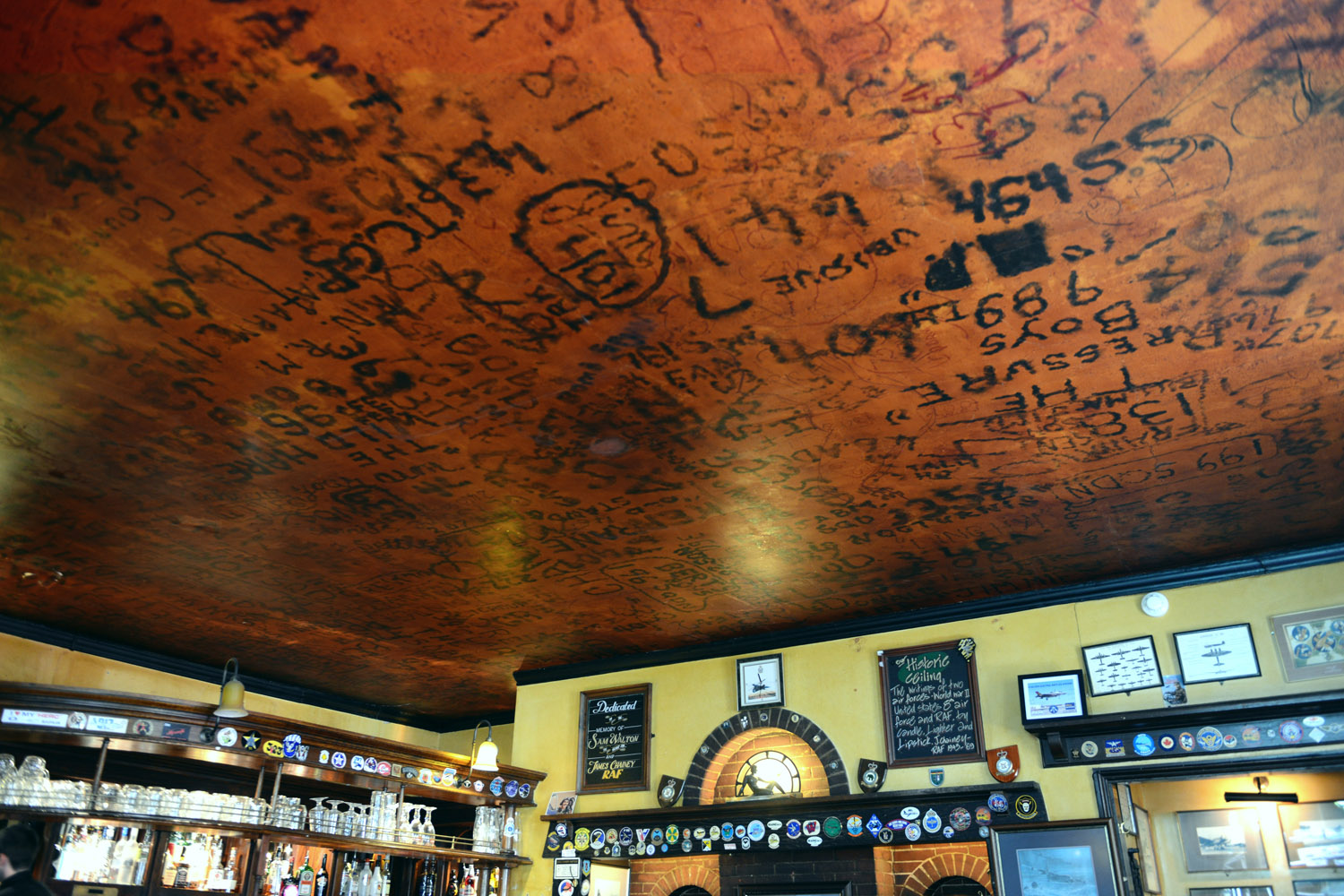 Graffiti on ceiling of pub