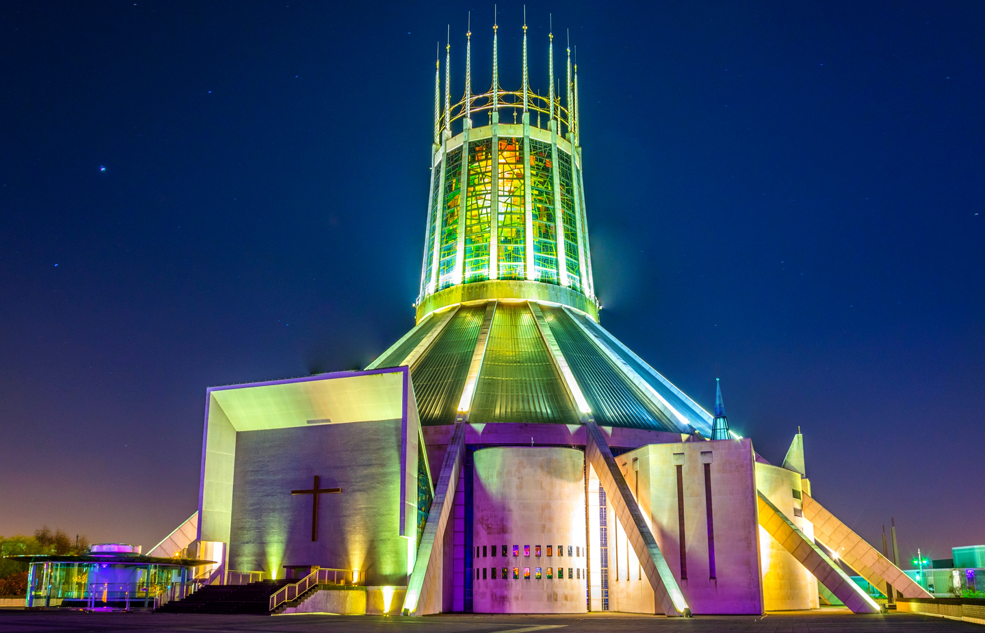 Liverpool Metropolitan Cathedral Circular concrete cathedral with spikes lit up at night