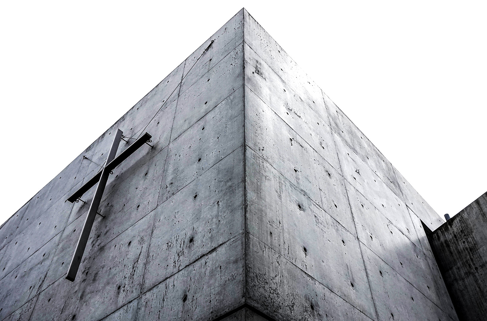 Church of the light, Osaka Concrete cube building with cross on the wall