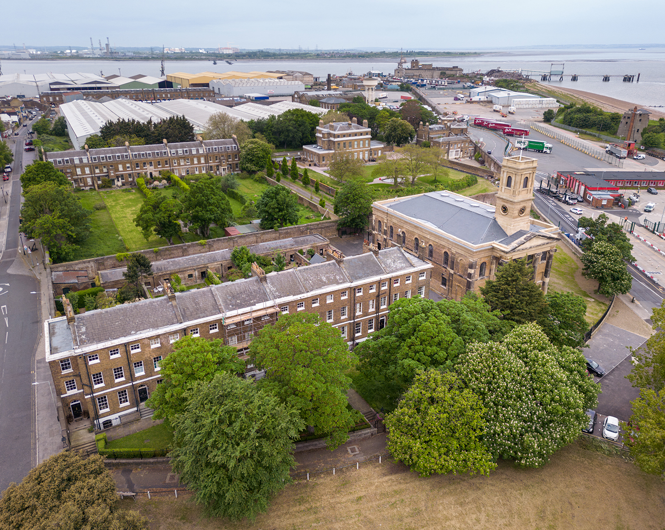 Sheerness Dockyard Church aerial Aerial view of converted dockyard church surrounded by old terraced housing next to a dockyard