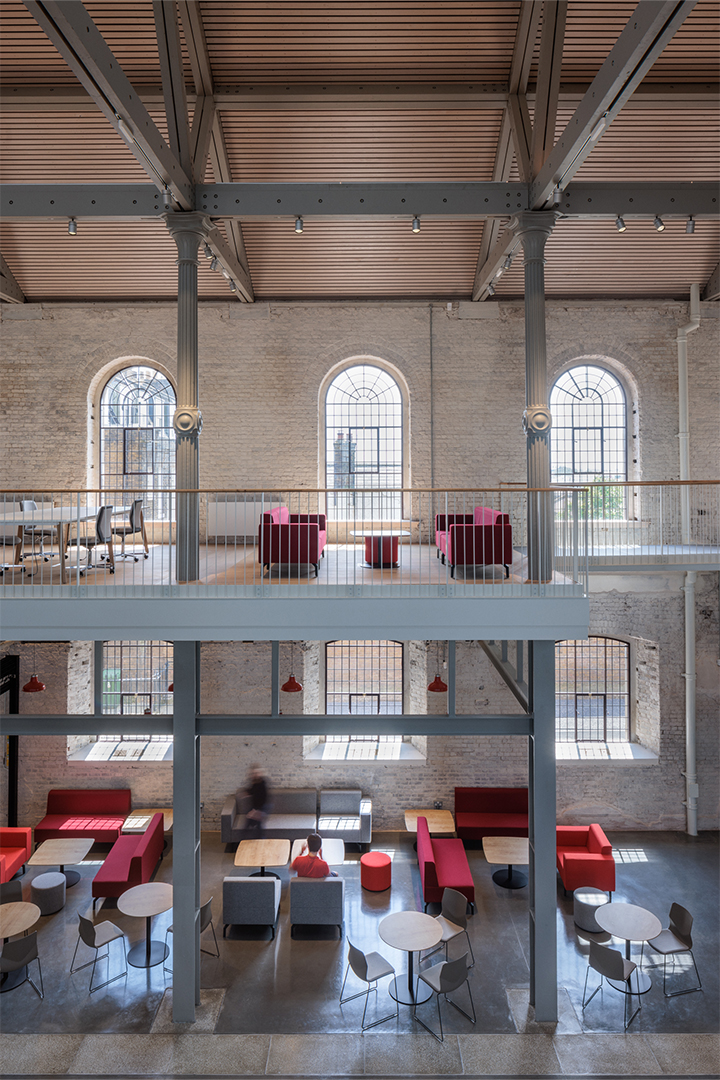 Sheerness Dockyard Church interior Converted dockyard church filled with two floors of minimal design meeting rooms, tables and chairs