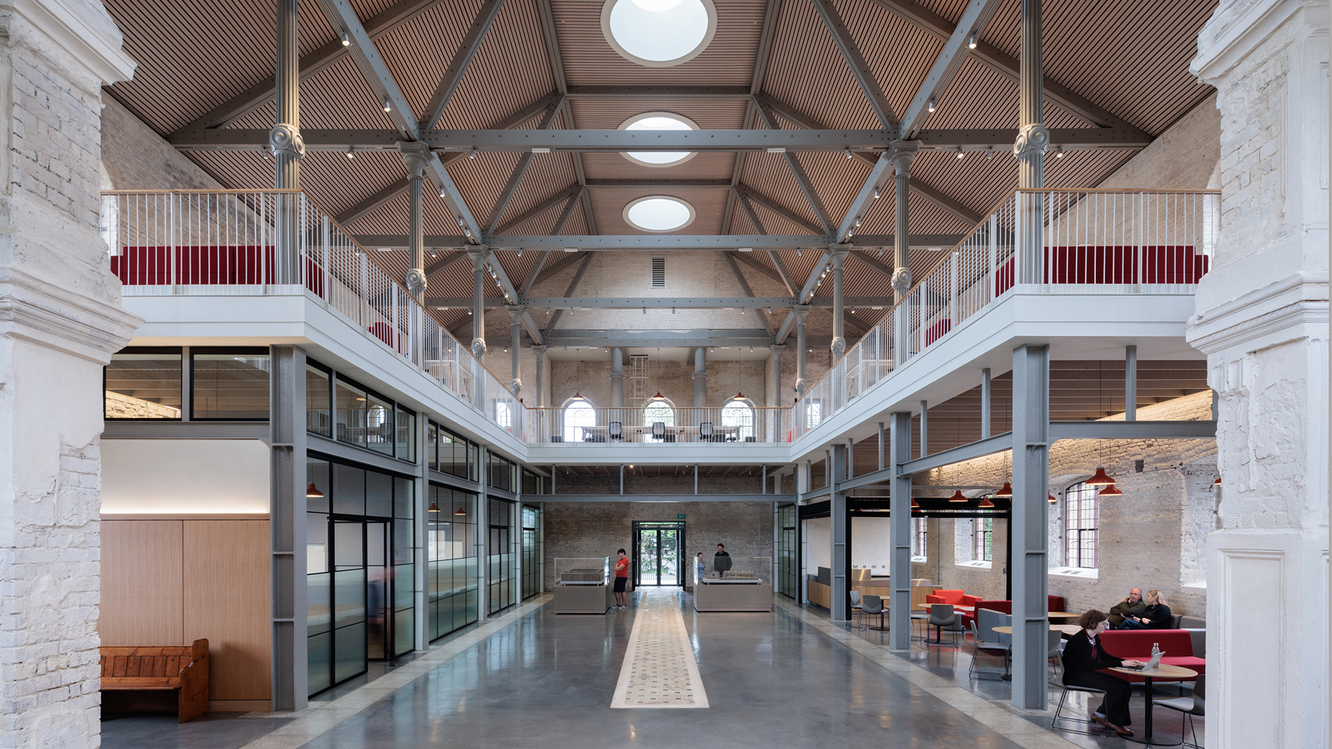 Sheerness Dockyard Church interior Converted dockyard church filled with two floors of minimal design meeting rooms, tables and chairs