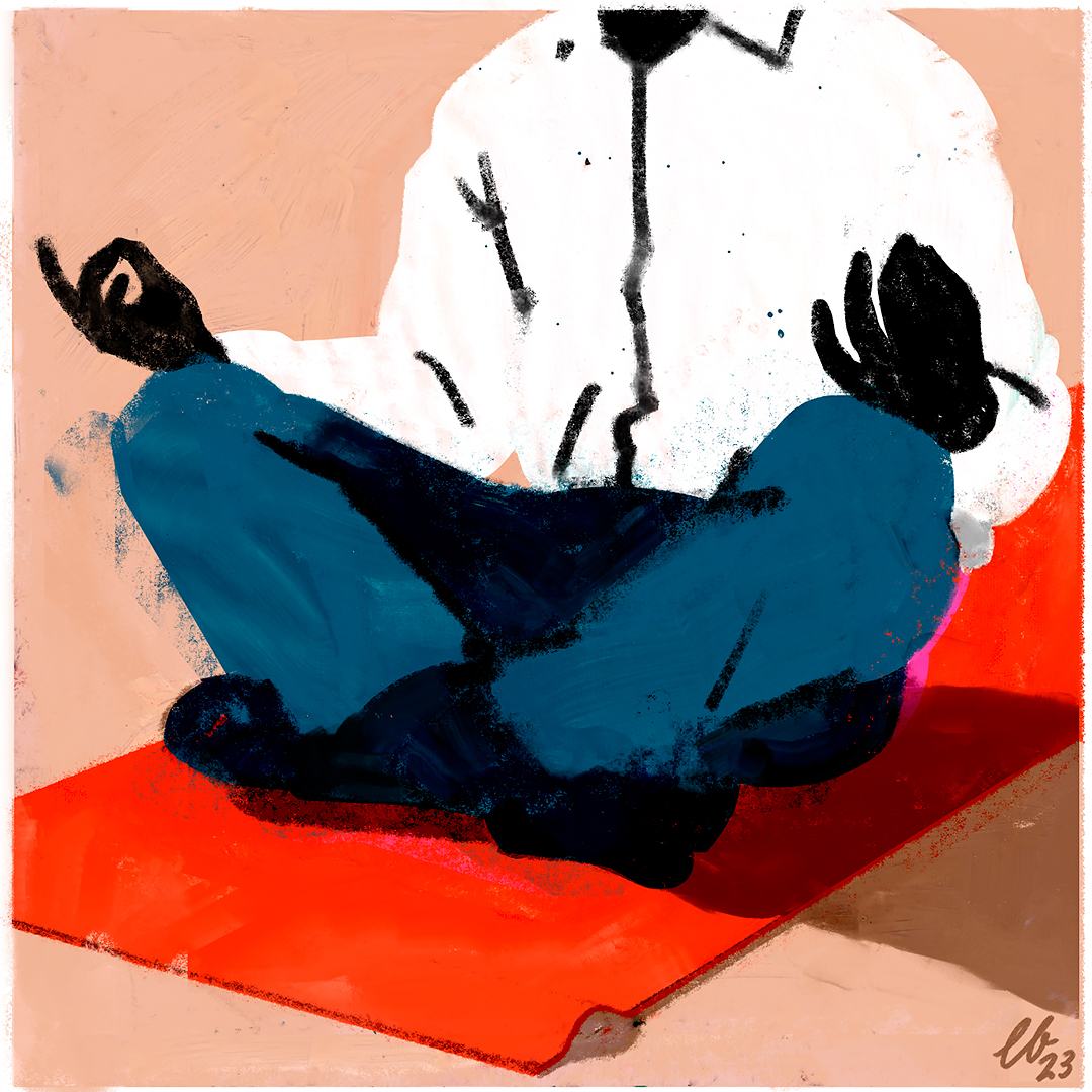 Man in business suit sits cross legged on a yoga mat meditating