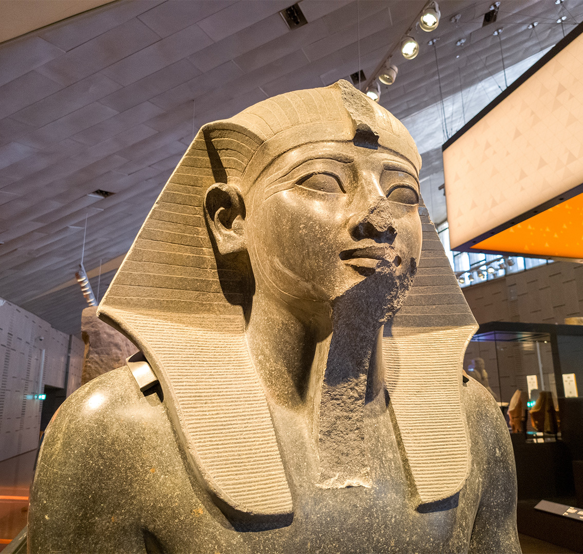 Grand Egyptian Museum statue Close up of Ancient Egyptian statue in museum