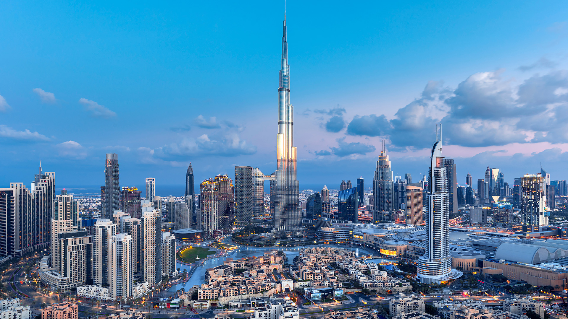 Photo of the Dubai skyline with the Burj Khalifa lit up 