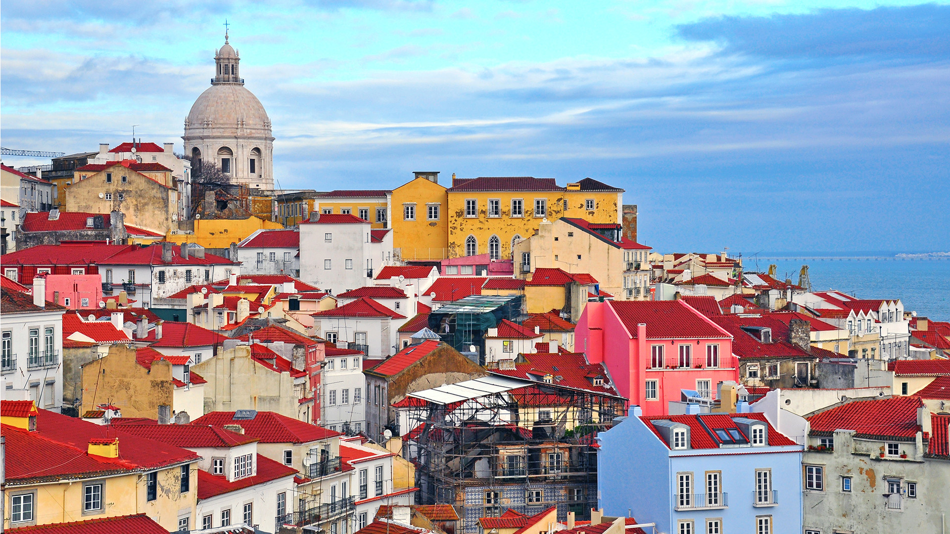 Photo of the colourful buildings in the Alfama district in Lisbon