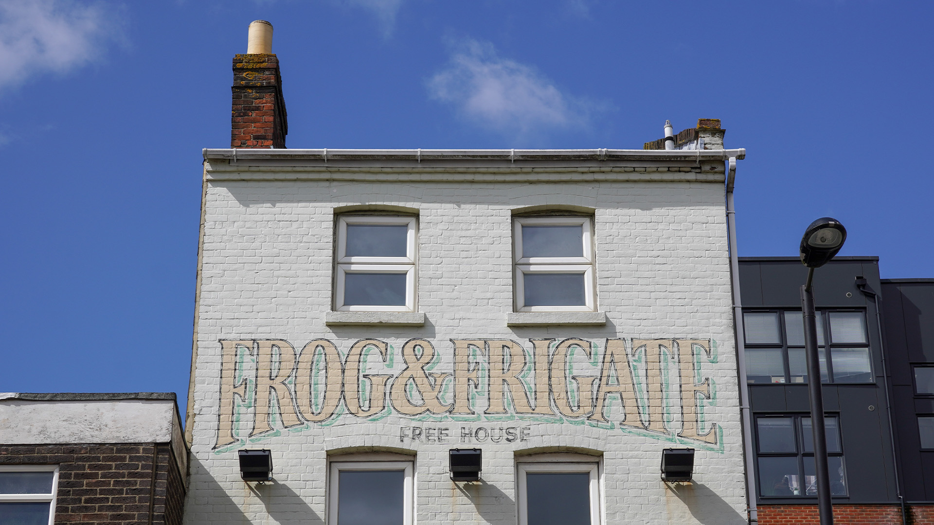 A pub with a free house sign