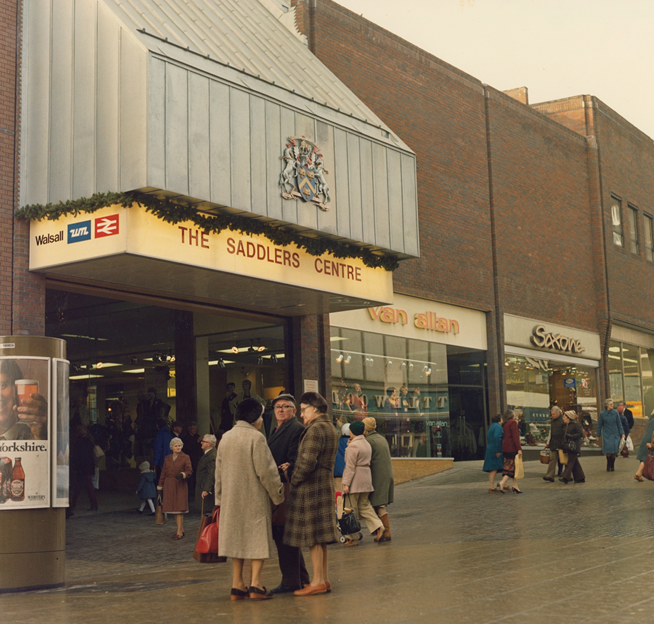 Archive photo of people stood outside saddlers shopping centre