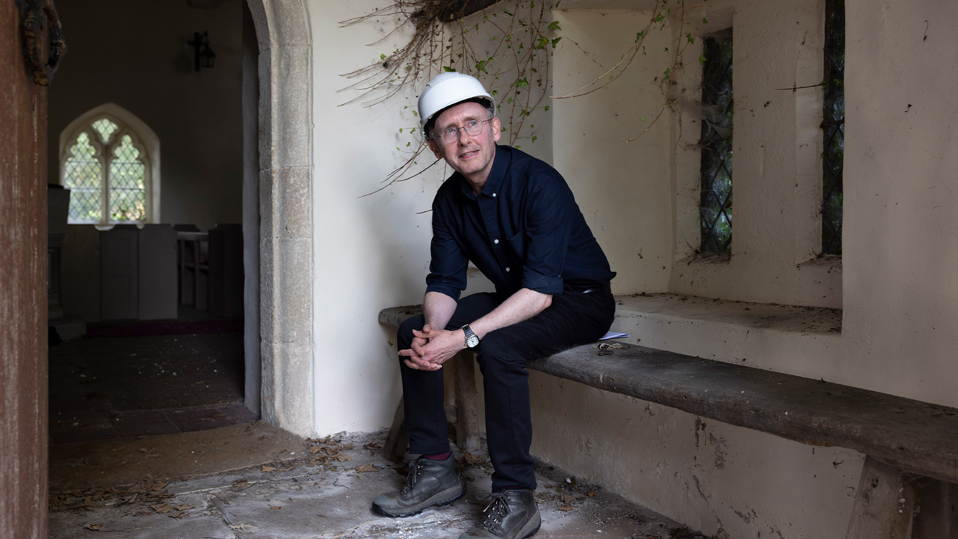 David Farrington MRICS sat in a church entrance