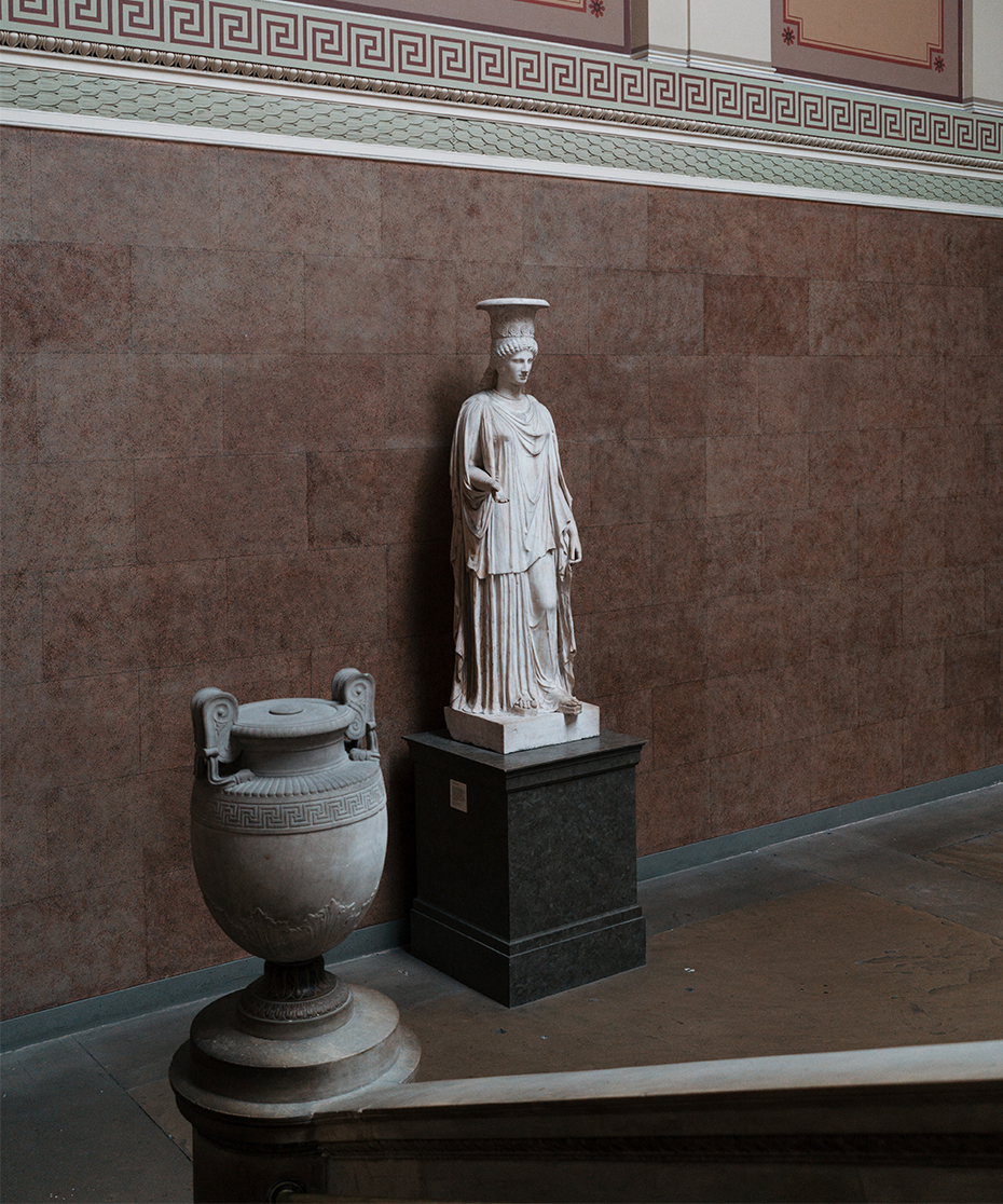 Sculptures at the bottom of a staircase