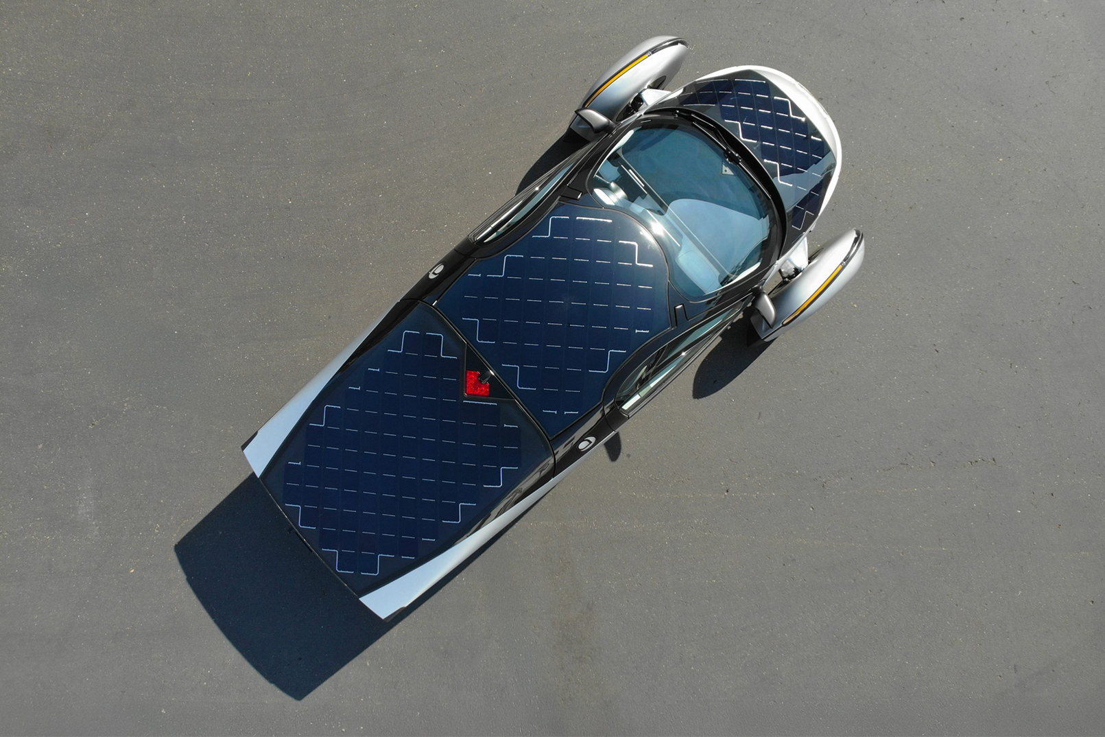 Solar panel vehicle Aptera Top down view of car with solar panel roof and bonnet