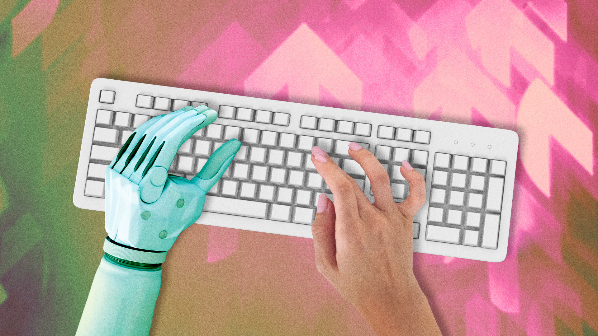 A robot hand a human hand type on a keyboard