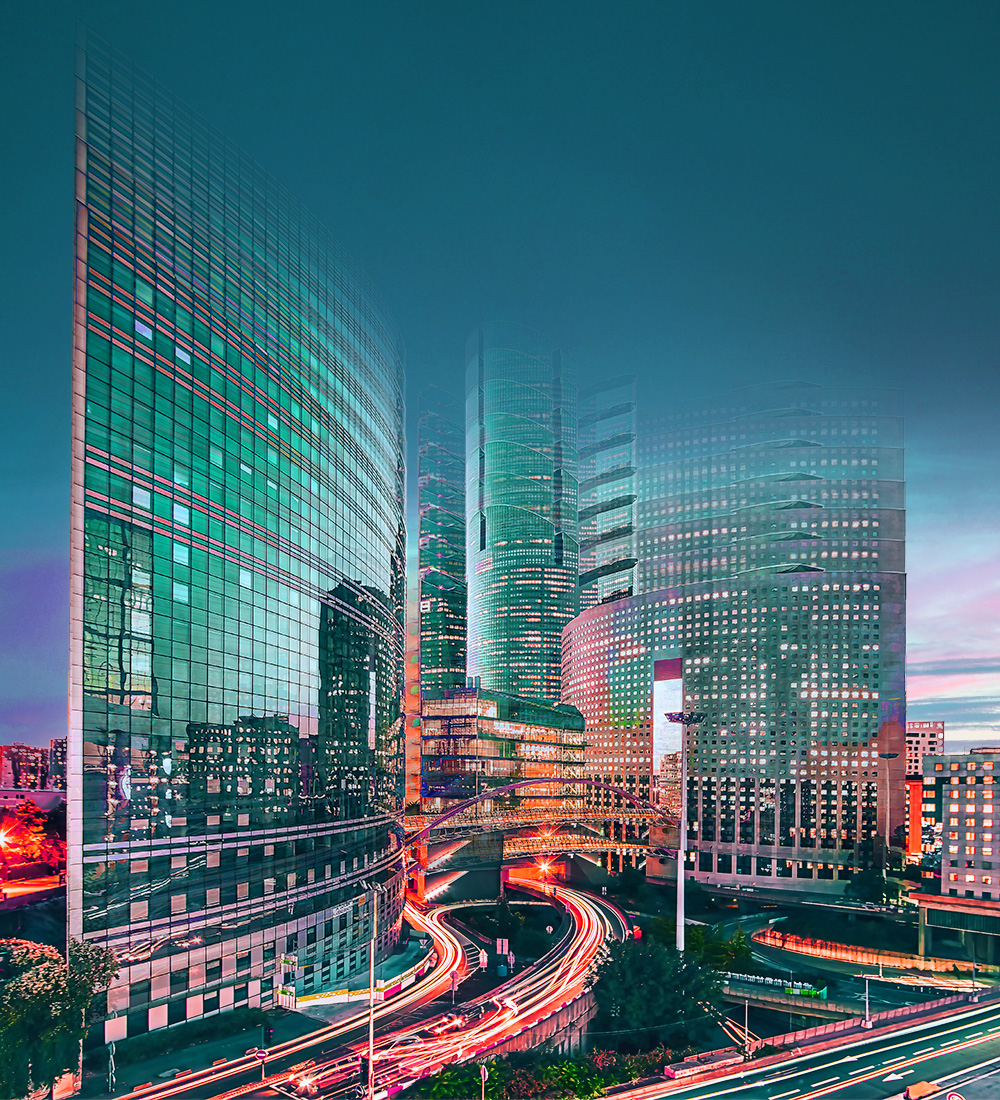 Office buildings lit up at night in a virtual effect