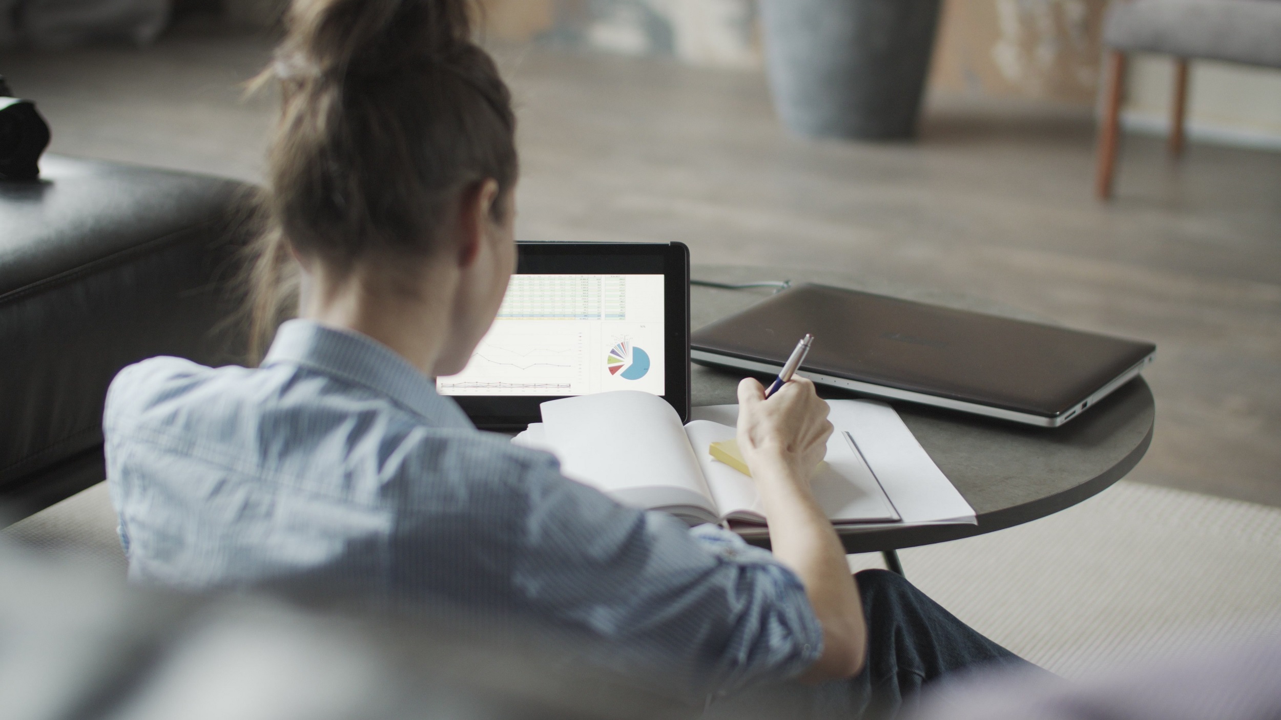 Businesswoman working on round table
