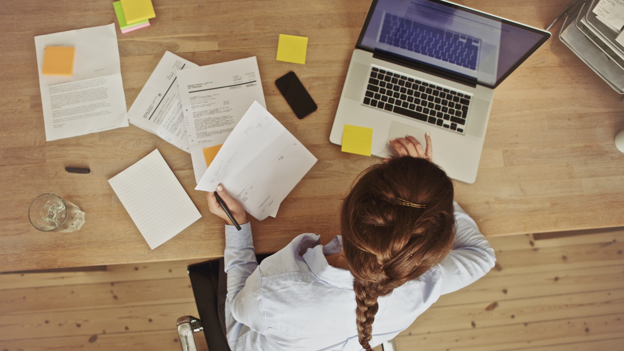 Businesswoman working on laptop