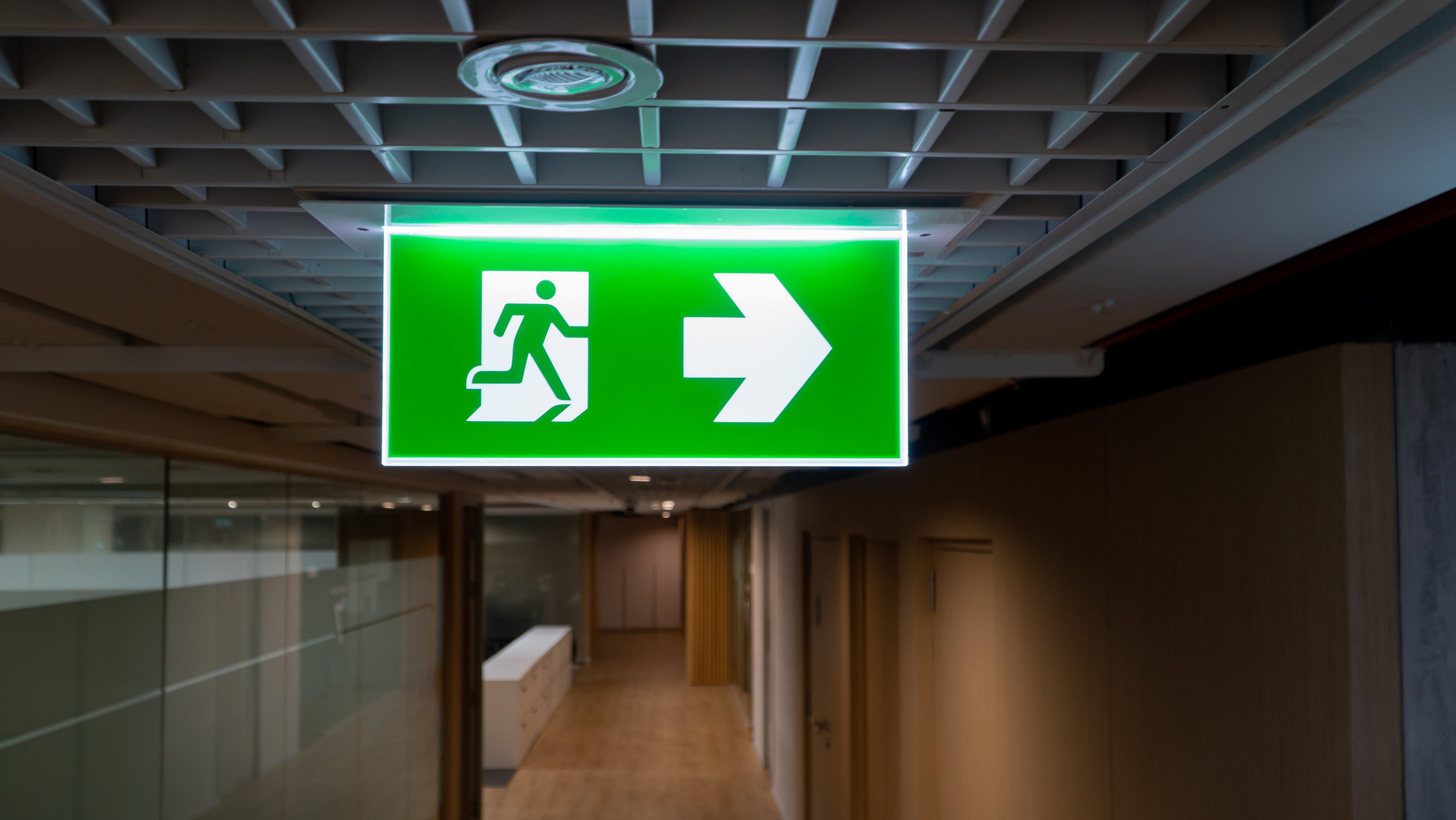 Fire exit sign on ceiling