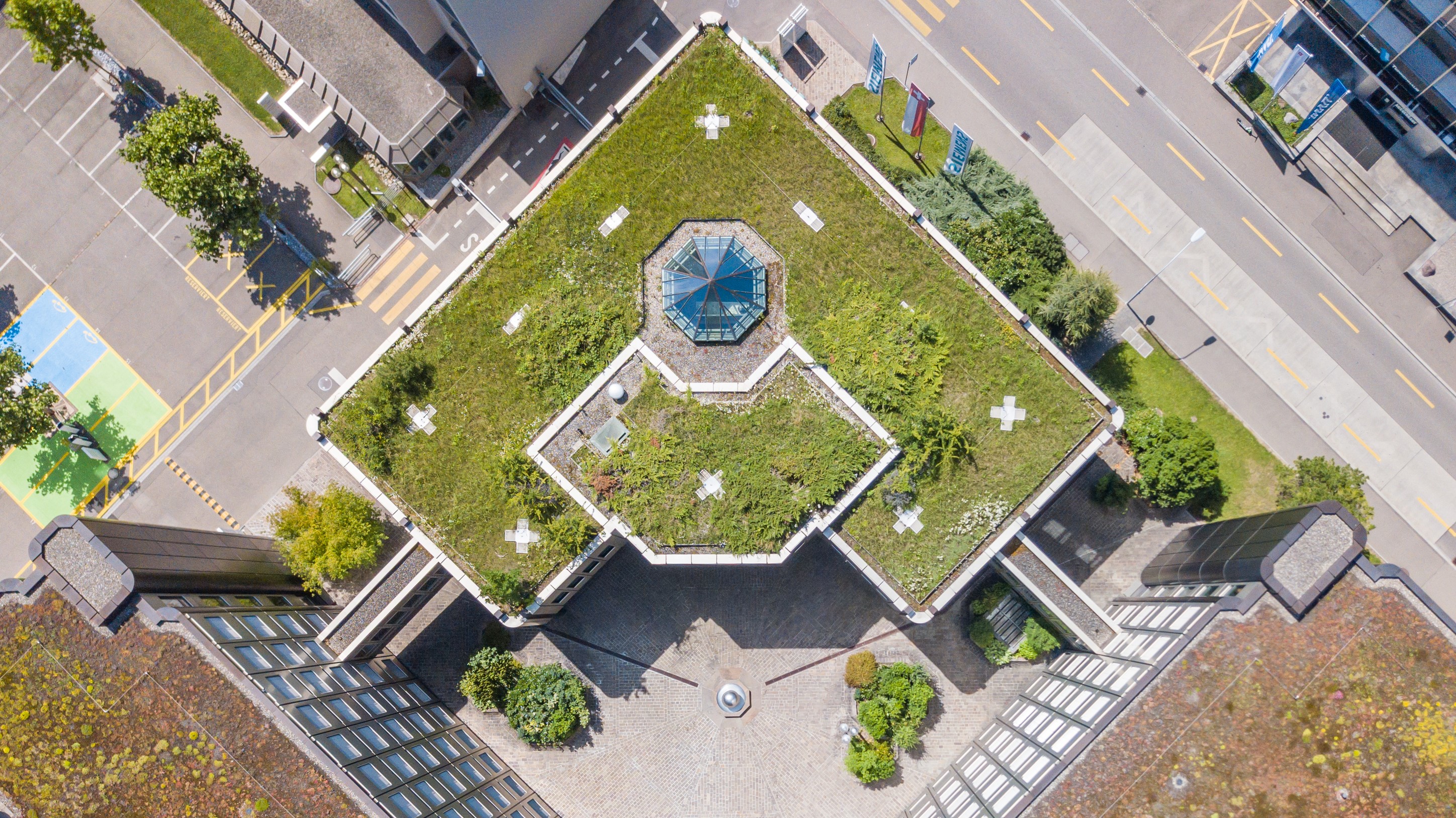 Aerial view of rooftop garden in urban residential area; Shutterstock ID 1821976676; purchase_order: na; job: CJ_Mar_23; client: ; other: 