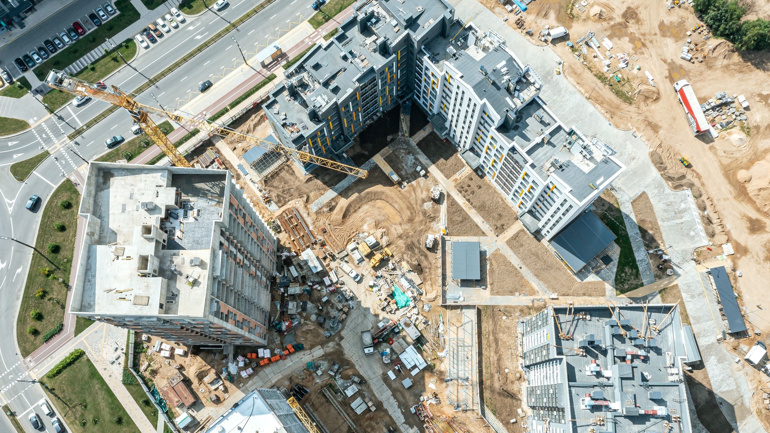 overhead photo of towers under construction