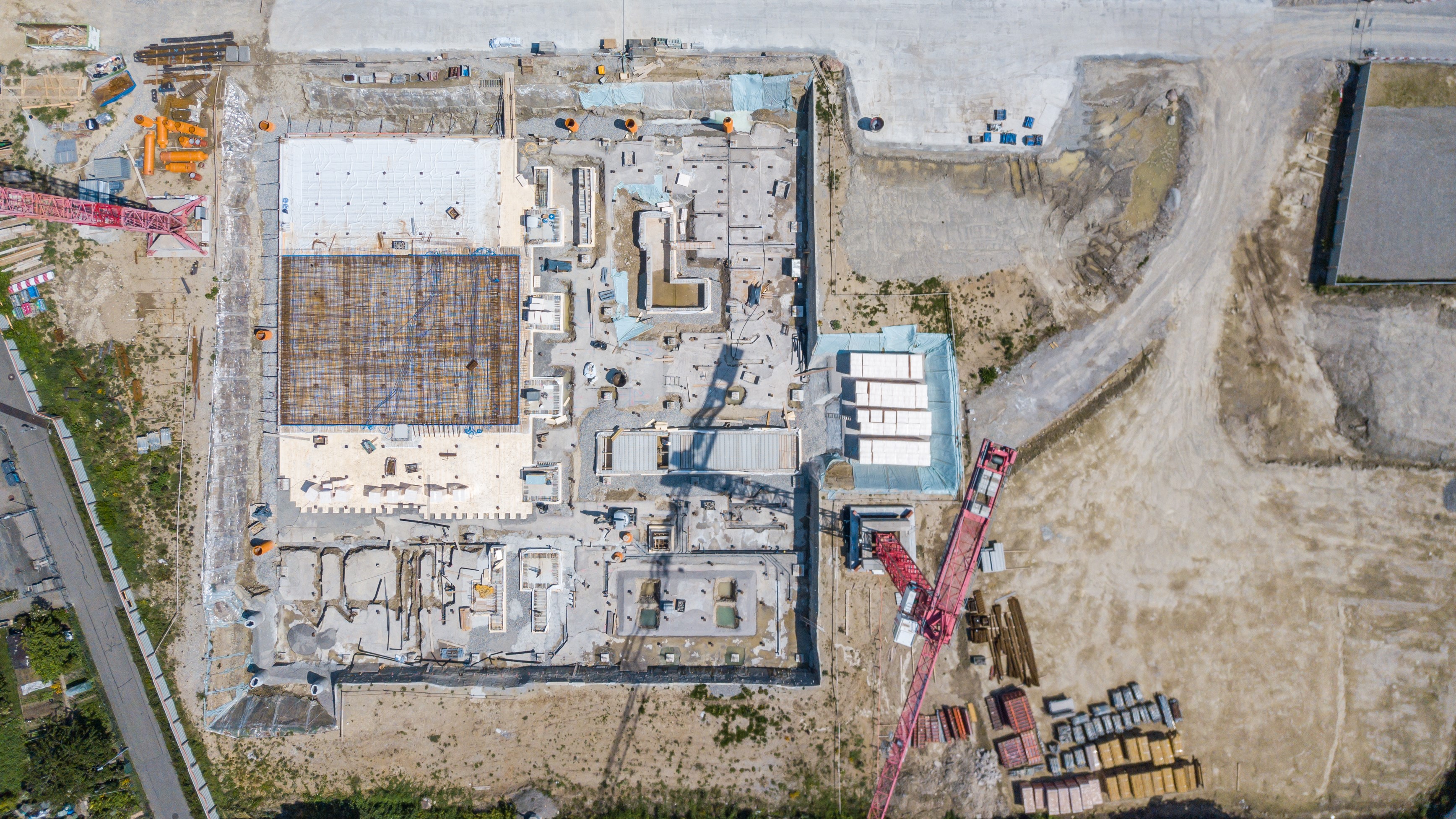 Aerial view of construction site on sunny summer day.; Shutterstock ID 1779147230; purchase_order: na; job: CJ BMH Aug; client: ; other: 