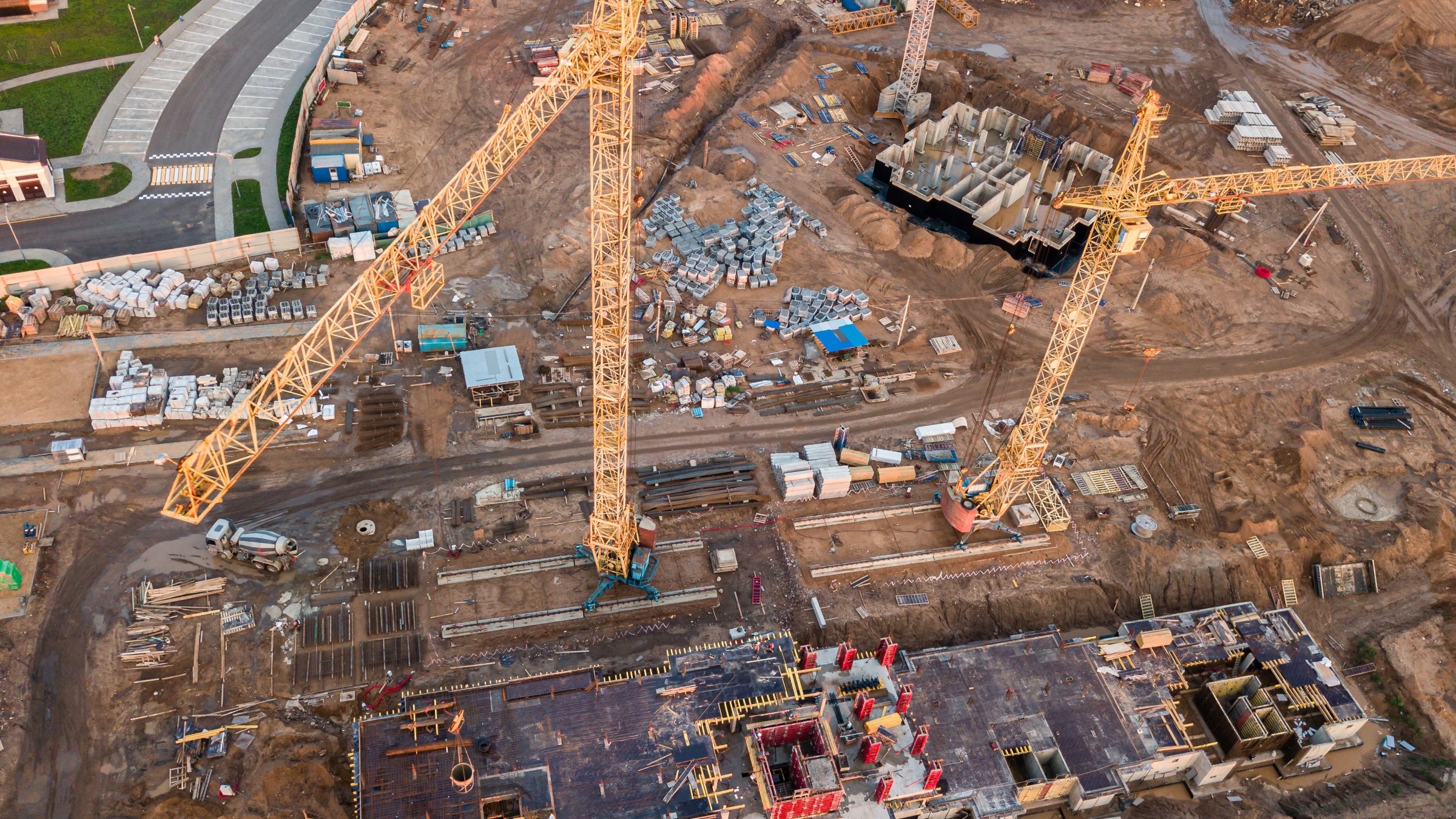 Overhead of cranes on building site