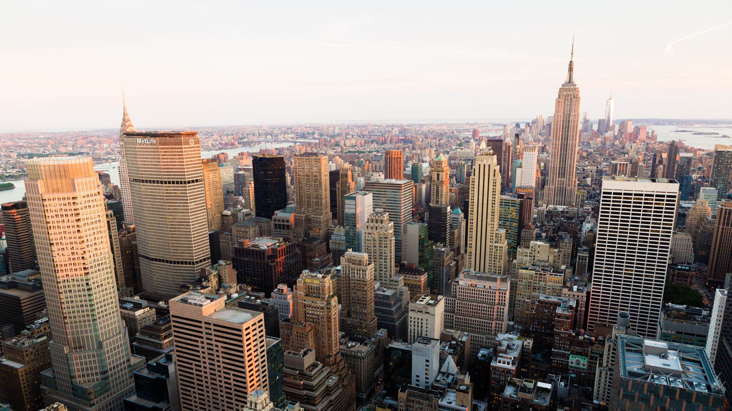 Overhead photo of new york city skyline showing empire state building and other large buildings