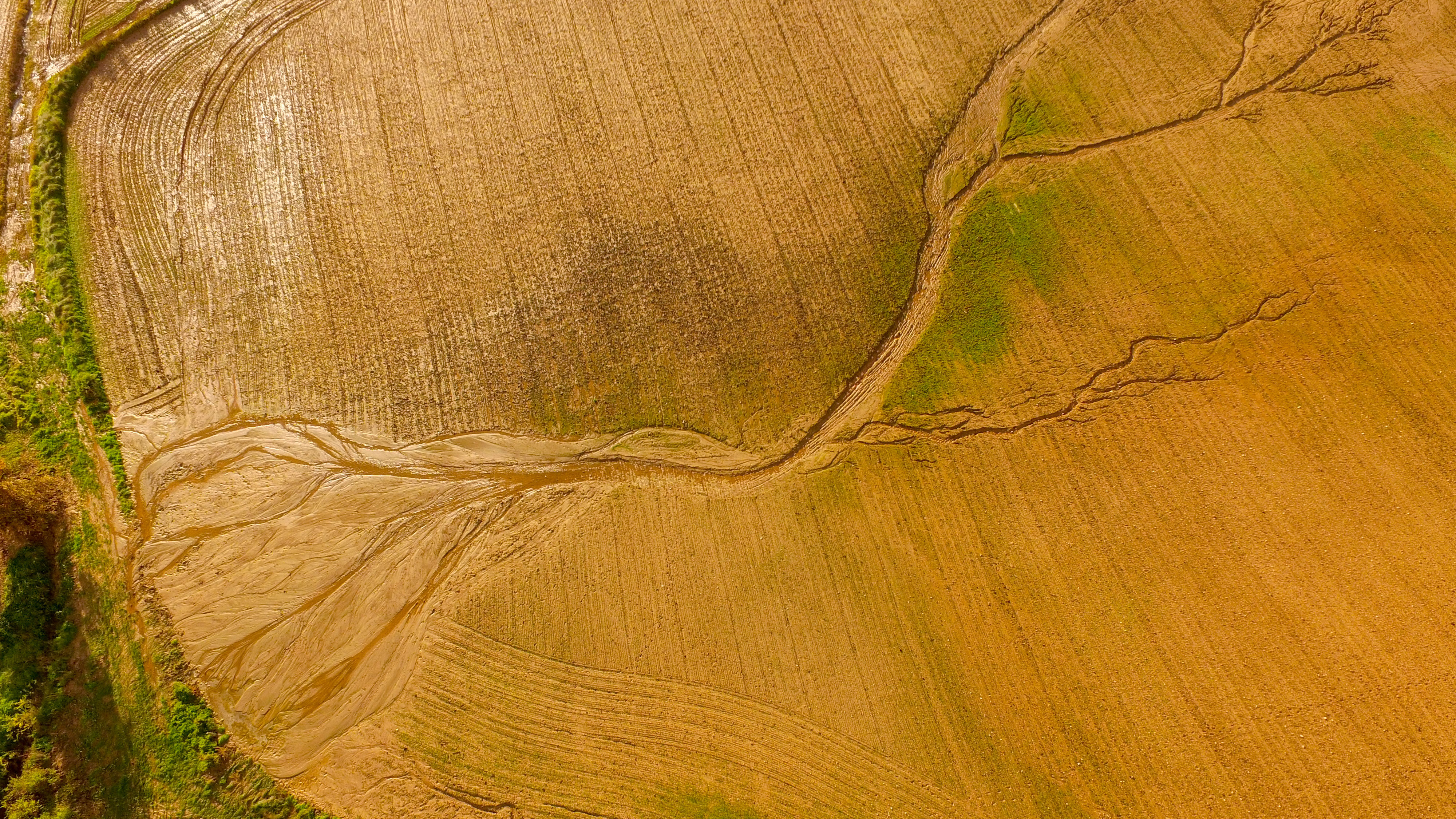 Aerial view of flood crop damage in agricultural field